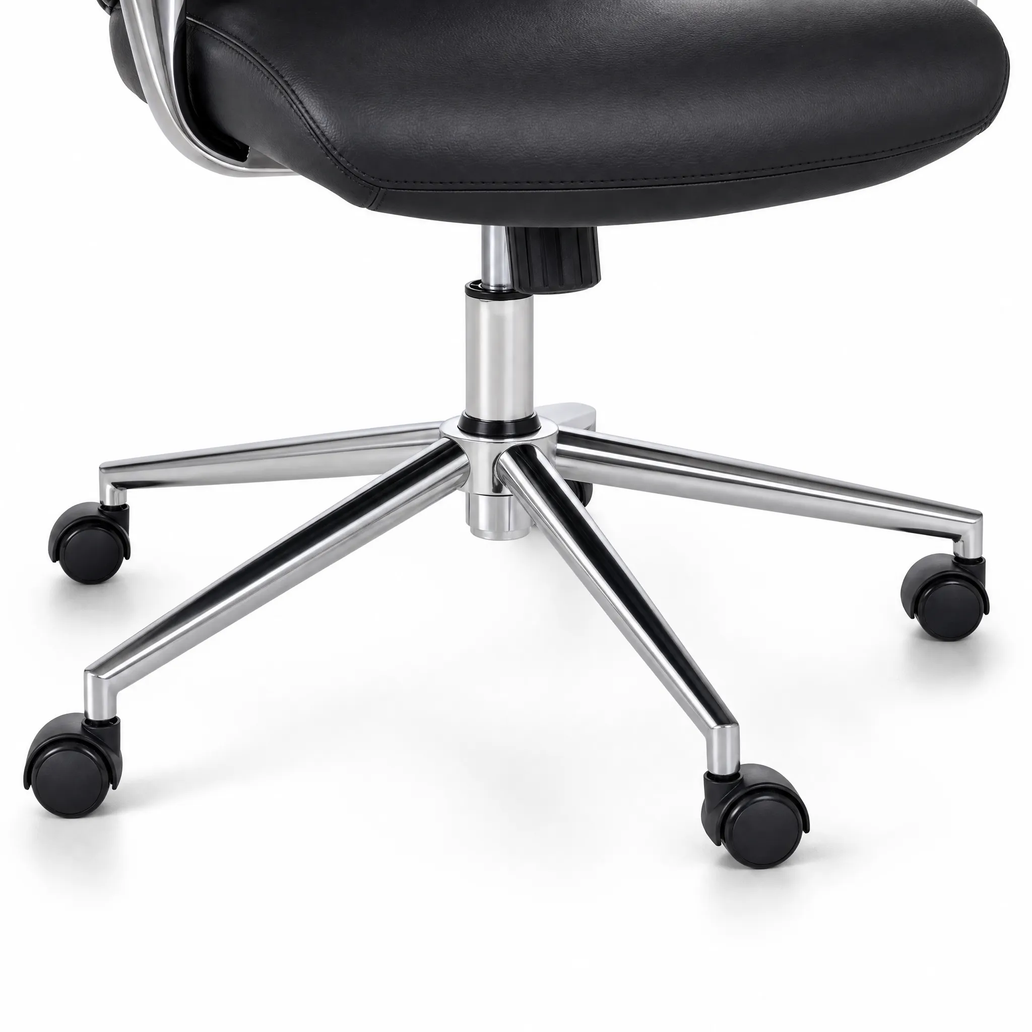 Generated with Kive.ai - Close-up product photograph of the caster base of Black office chair_ tightly framed on the central lift cylinder_ five brushed-metal legs_ and black caster wheels. Show the lower edge.png